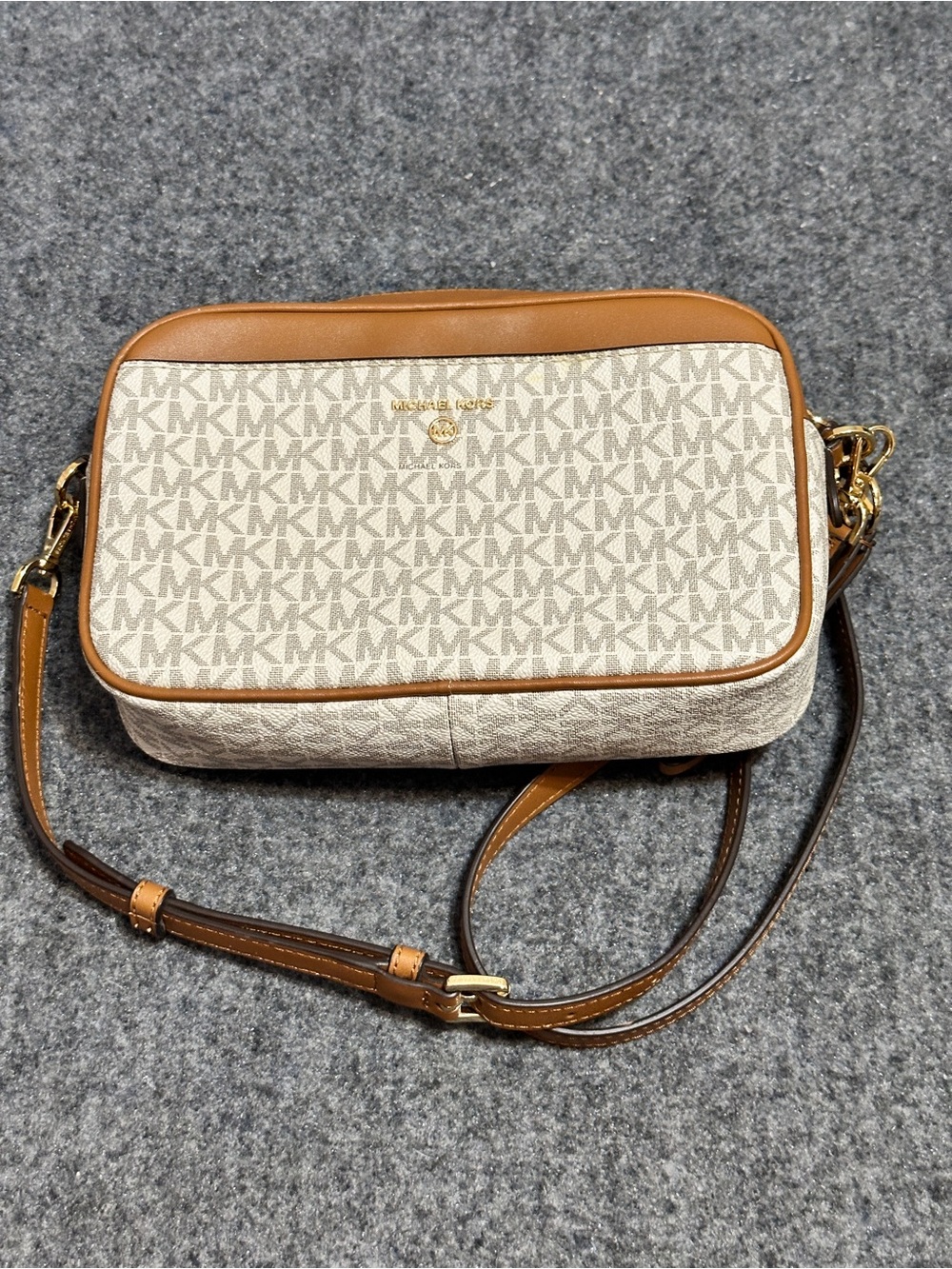 That is the MICHAEL Michael Kors Jet Set Charm Large East West Camera Crossbody,